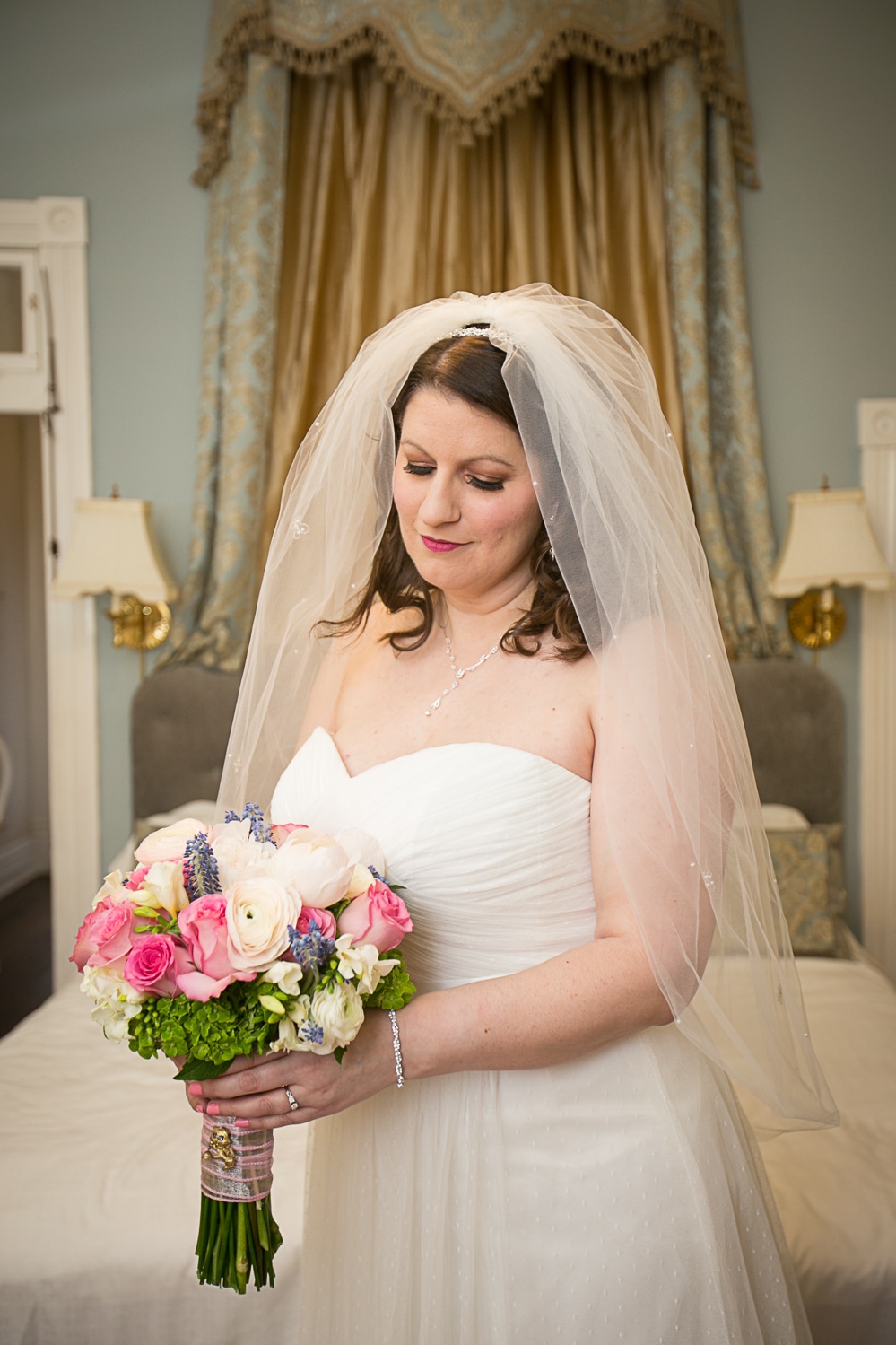 The bride in bridal suite at Carriage Lane Inn 