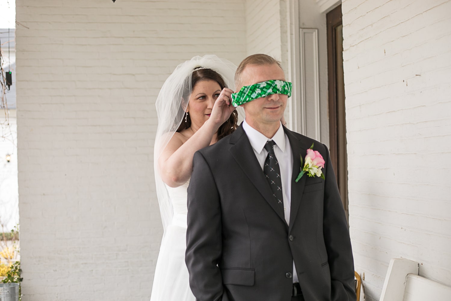 First look, groom blindfolded. Carriage Inn Lane wedding
