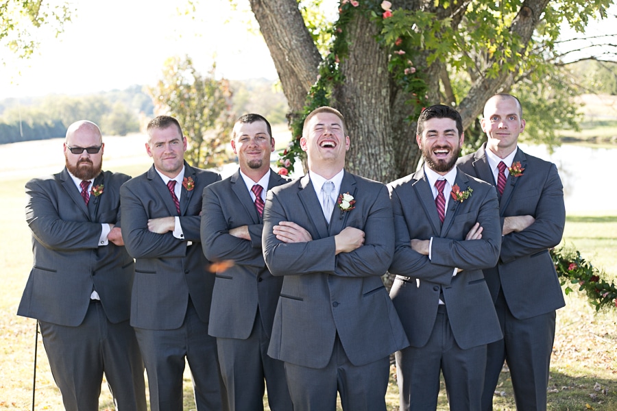 groom and groomsmen laughing